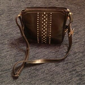 Lightly used American West black crossbody purse!